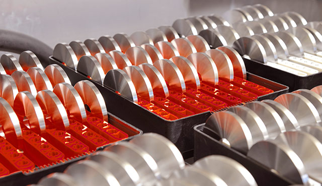 Mikroskopaufnahme eines mehrschichtigen Belags